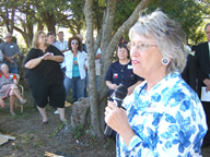 Lolisa Laenger opens the ceremony.